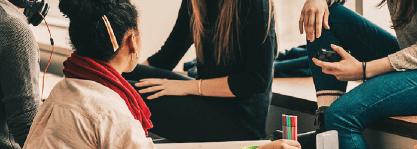 millennials sitting together