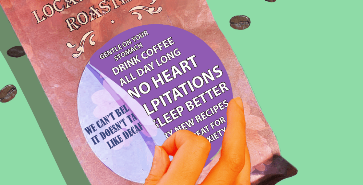 a bright orange hand peeling back sticker on decaf coffee bag